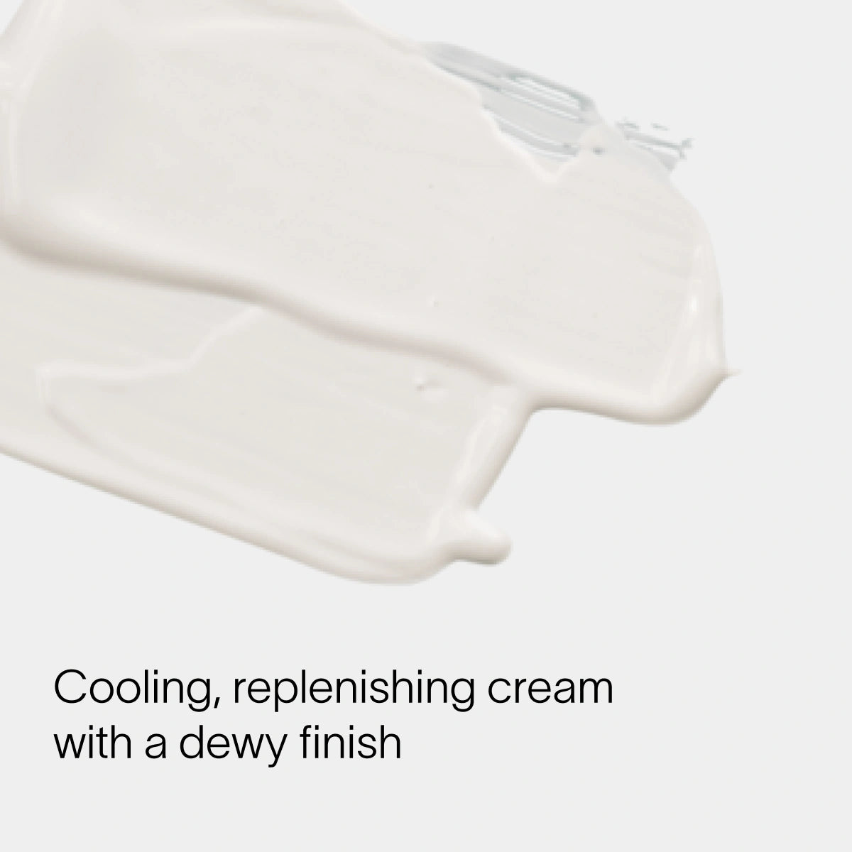 A smear of white cream with a dewy finish is shown close-up on a light surface. Text reads, LightBoost Eye Cream by Solawave: Cooling, replenishing cream infused with vegan collagen for a dewy finish.