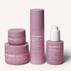 Four Solawave skincare products featuring Vegan Collagen are displayed in pink packaging with white text, including the LightBoost Eye Cream, Wand Activating Serum, Rich Cream, and Face & Neck Serum.